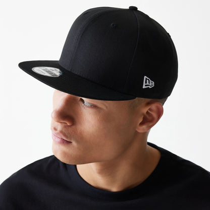 This is a New Era All Black 9FIFTY Cap 1