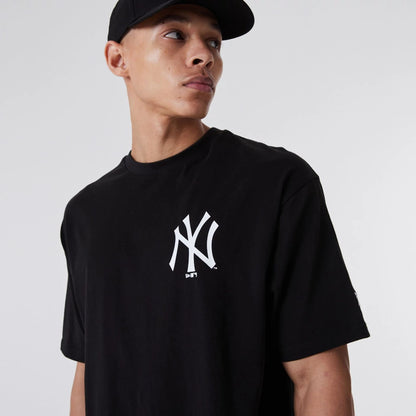 The Male model is wearing New York Yankees Essentials Oversized Black T-Shirt 8