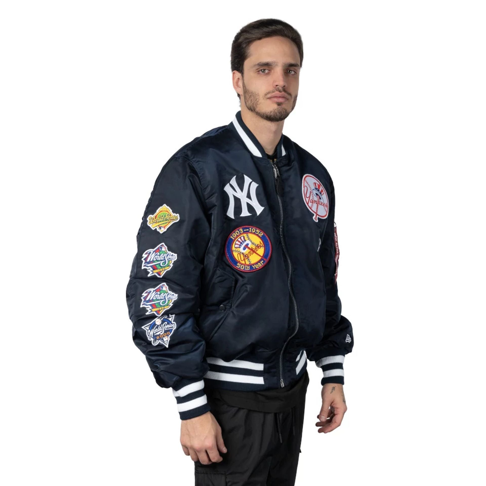 The Male model is wearing New York Yankees Alpha Industries Blue Reversible Bomber Jacket 2