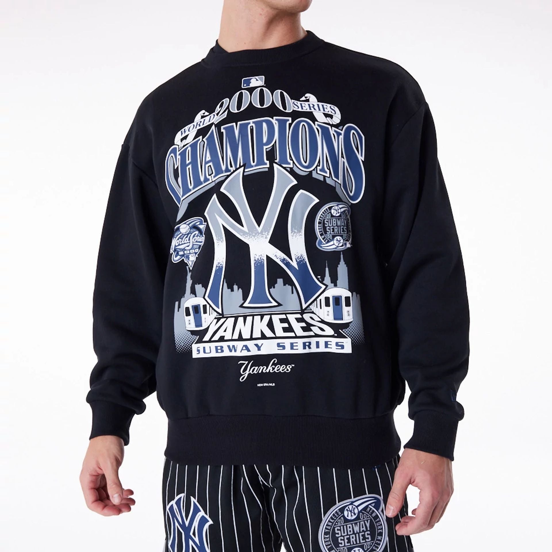 The Male model is wearing New York Yankees New Era Australia Black Oversized Sweater 3