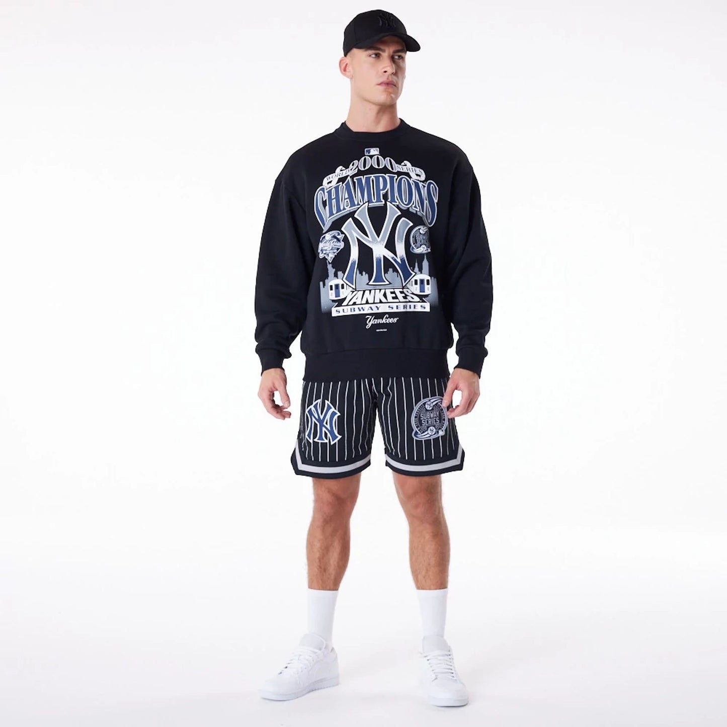 The Male model is wearing New York Yankees New Era Australia Black Oversized Sweater 6