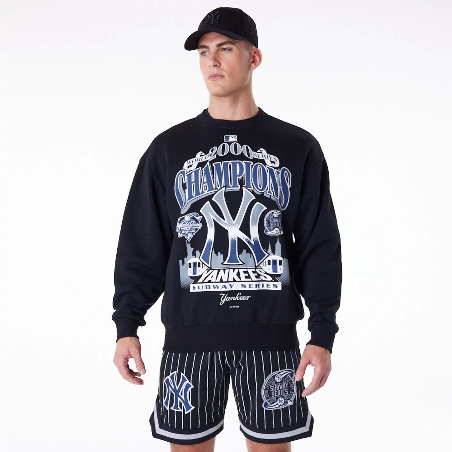 The Male model is wearing New York Yankees New Era Australia Black Oversized Sweater 1