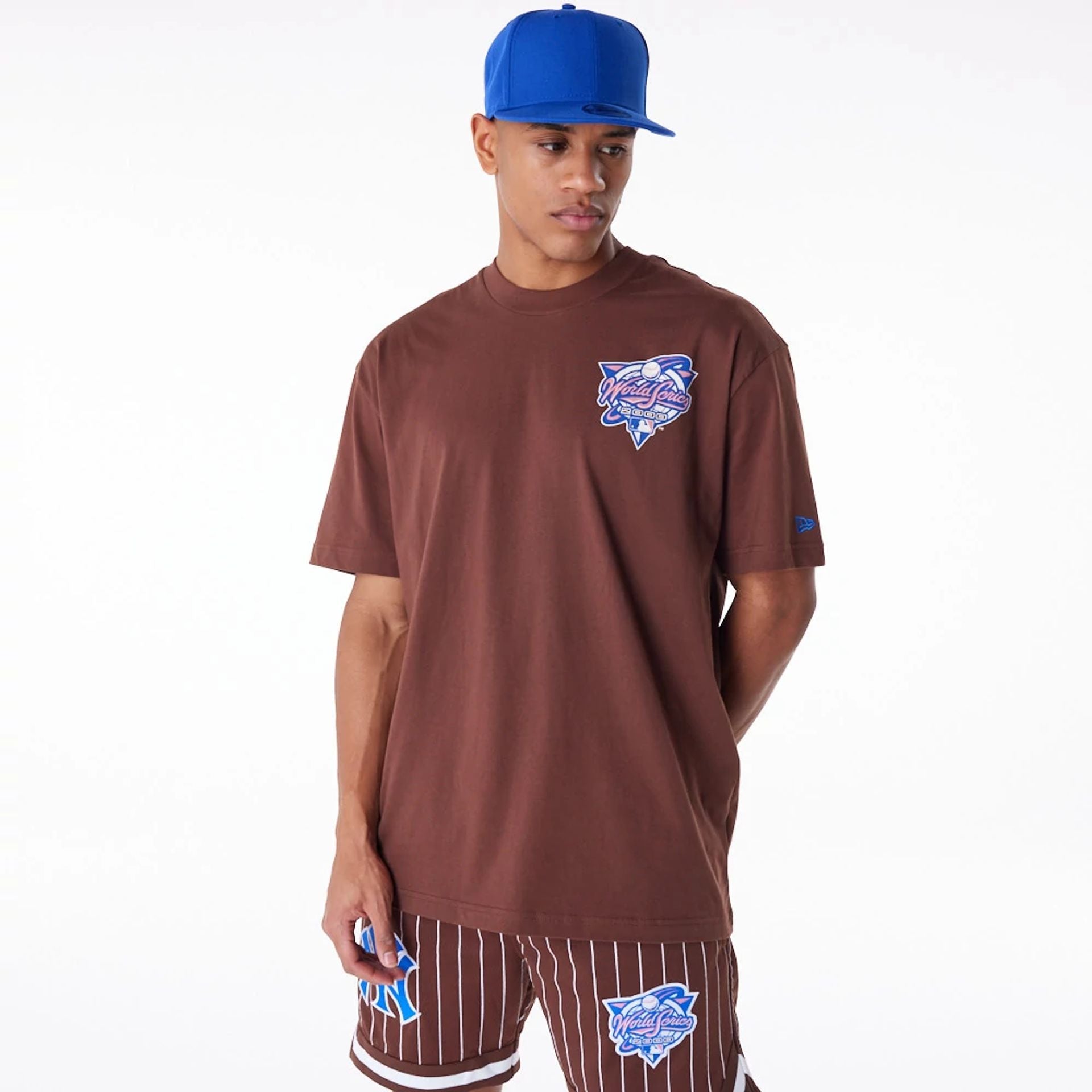 The Male model is wearing Subway Series New Era Australia Brown Oversized T-Shirt 6