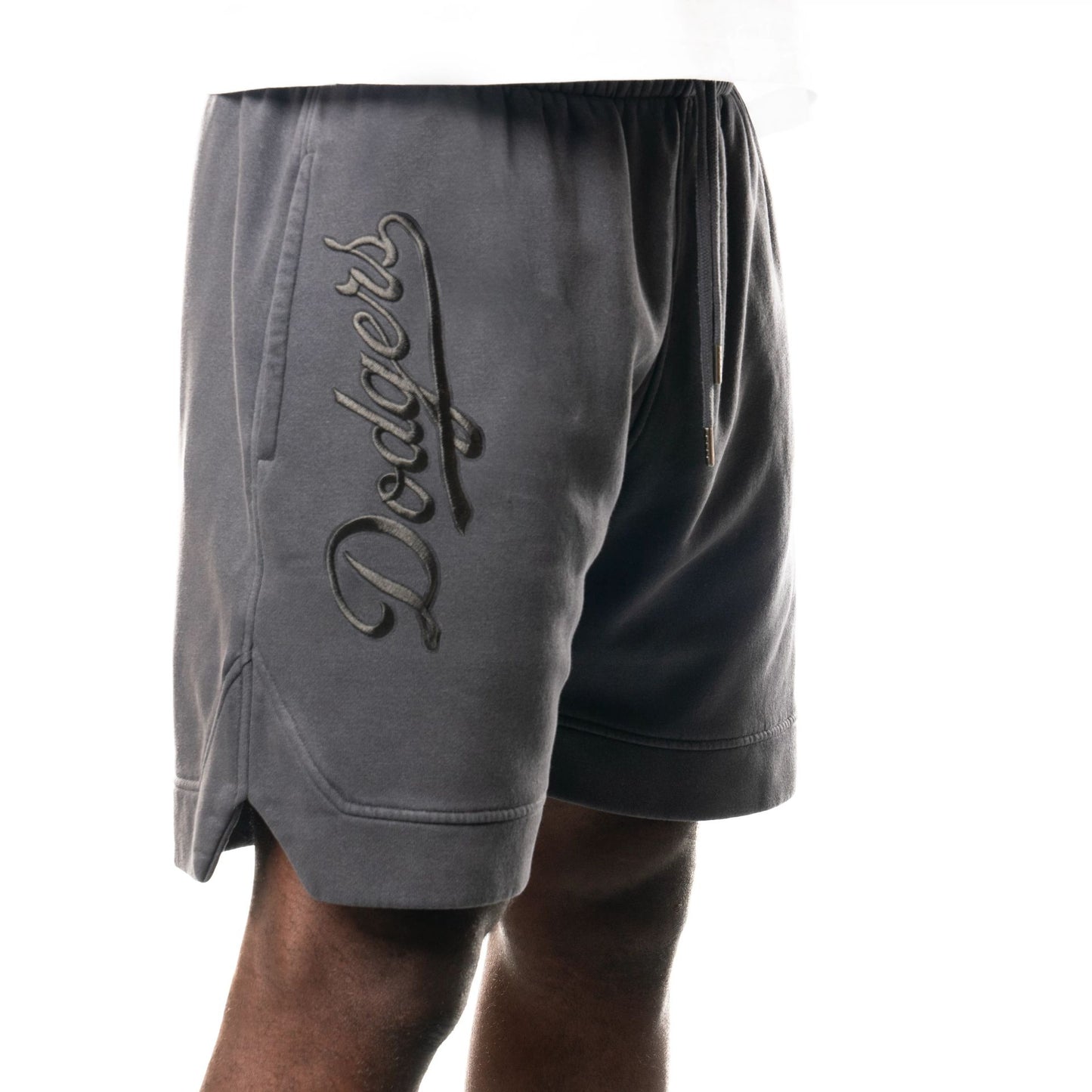 The Male model is wearing LA Dodgers New Era Australia Charcoal Fleece Shorts  3