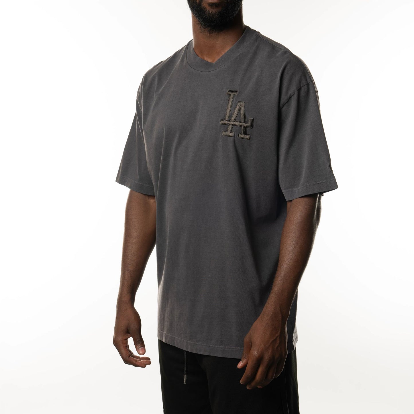 The Male model is wearing LA Dodgers New Era Australia Charcoal Oversized T-Shirt  3