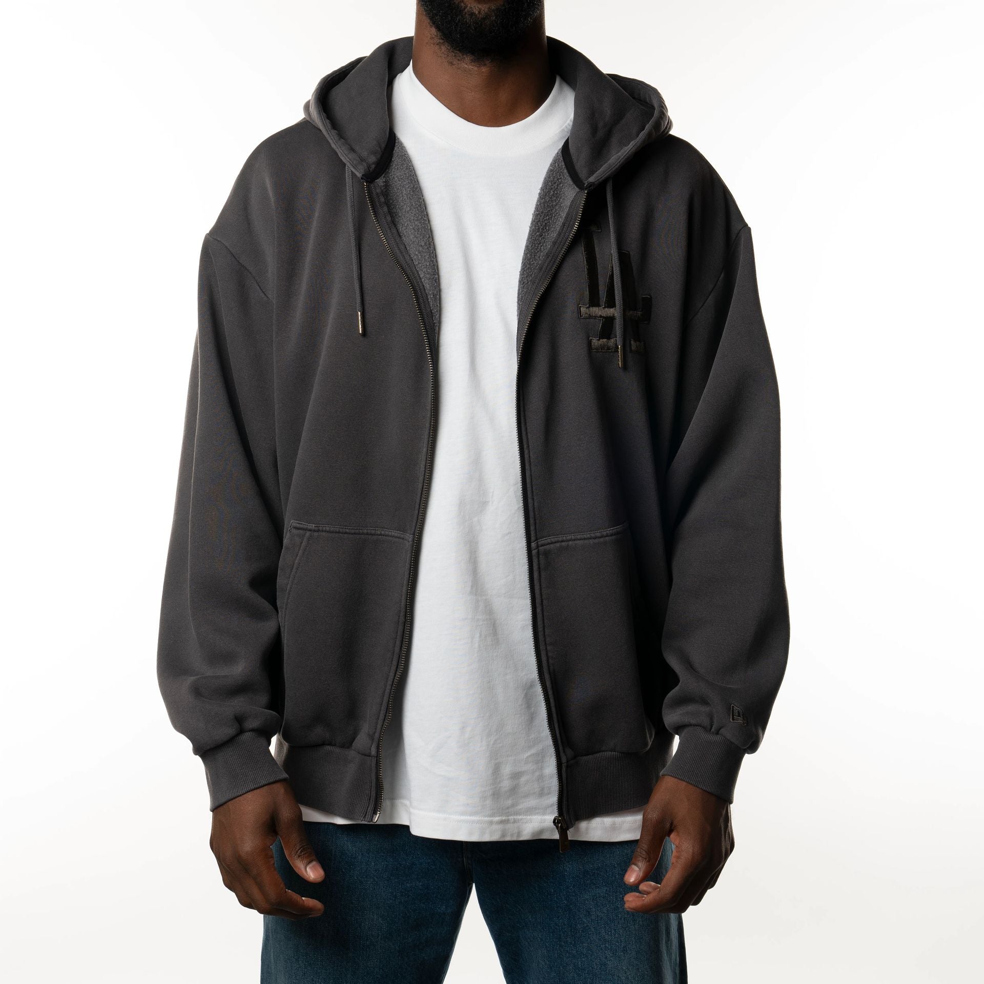 The Male model is wearing LA Dodgers New Era Australia Charcoal Oversized Full Zip Hoodie  5