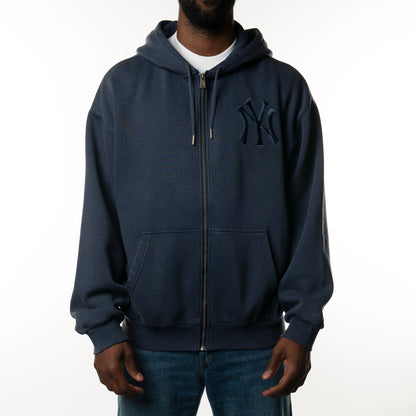 The Male model is wearing New York Yankees New Era Australia Dark Blue Oversized Full Zip Hoodie  4