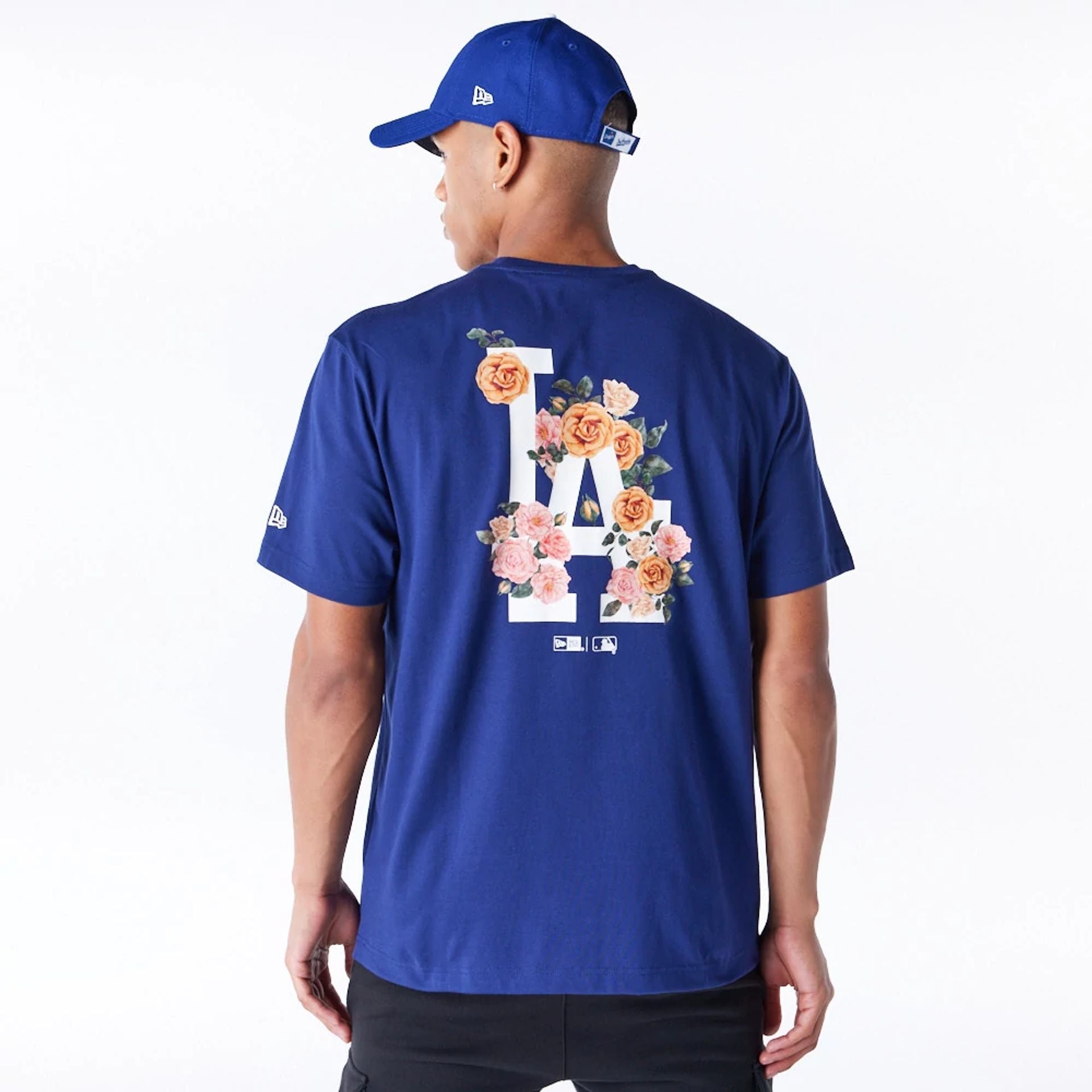 The Male model is wearing LA Dodgers MLB Flower New Era Korea Blue T-Shirt 1