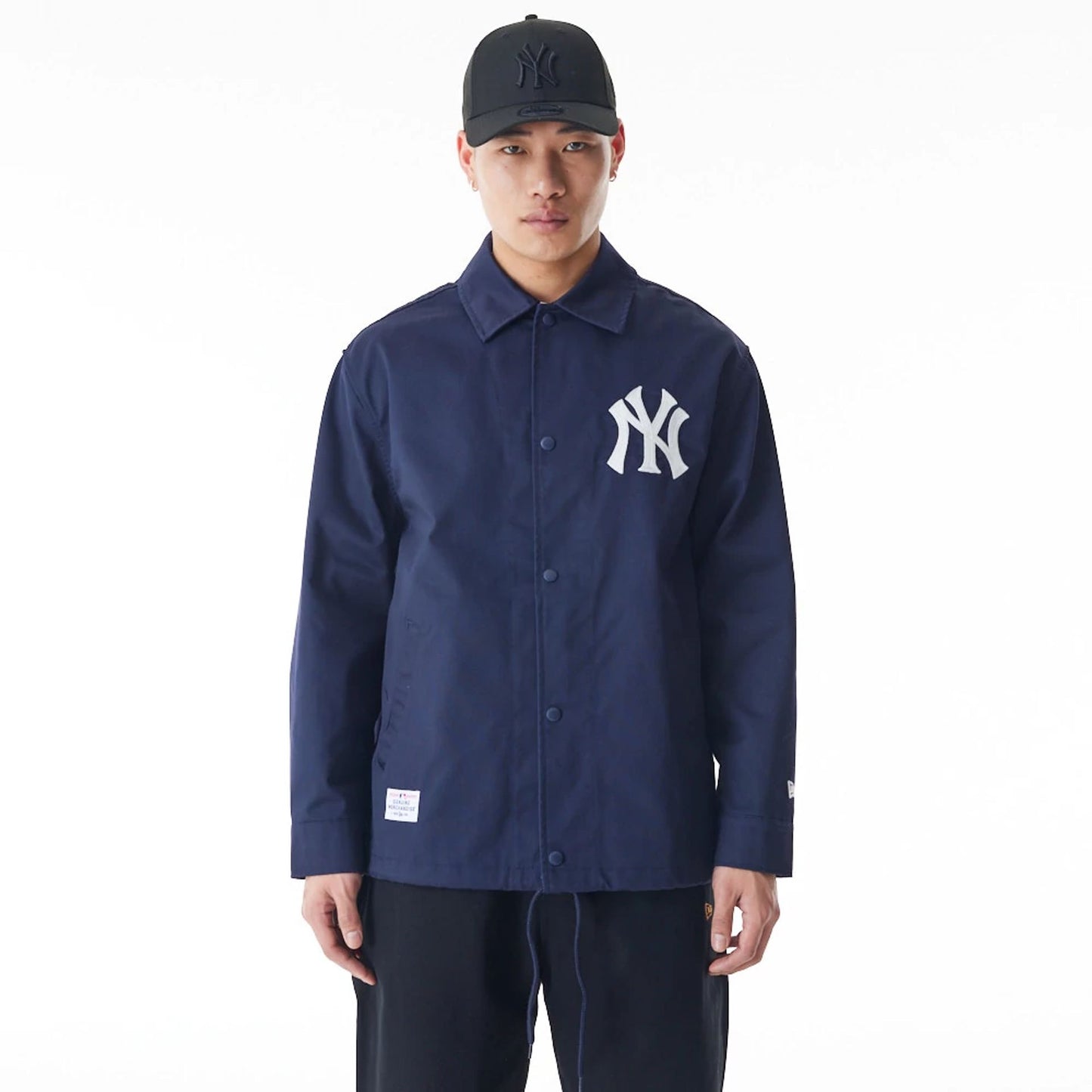 The Male model is wearing New York Yankees New Era Korea MLB Coach Navy Jacket 1