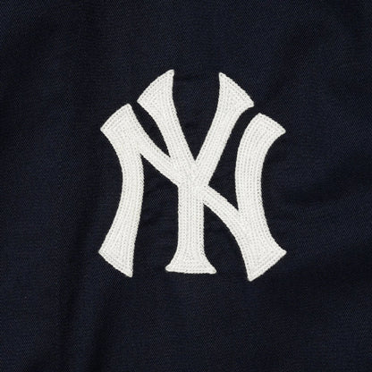 The Male model is wearing New York Yankees New Era Korea MLB Coach Navy Jacket 6