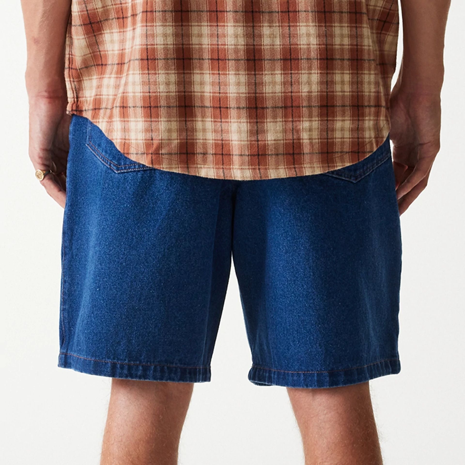 The Male model is wearing New York Yankees Dark Blue Denim Shorts 6