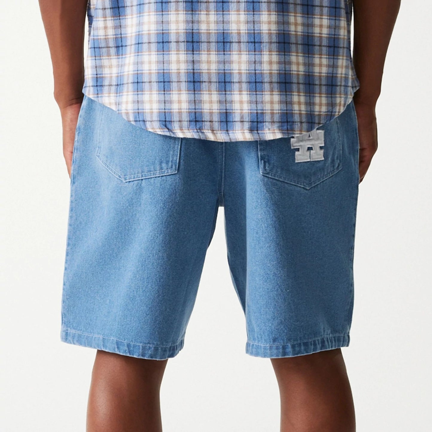 The Male model is wearing LA Dodgers Light Blue Denim Shorts 6