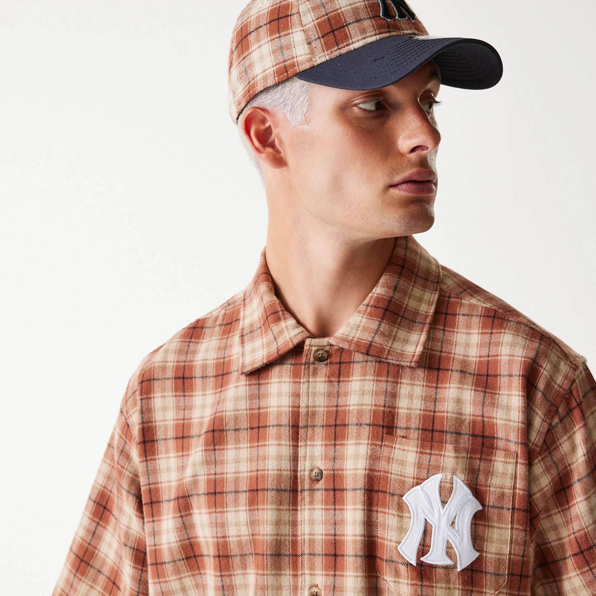 The Male model is wearing New York Yankees Plaid Brown Short Sleeve Shirt 4