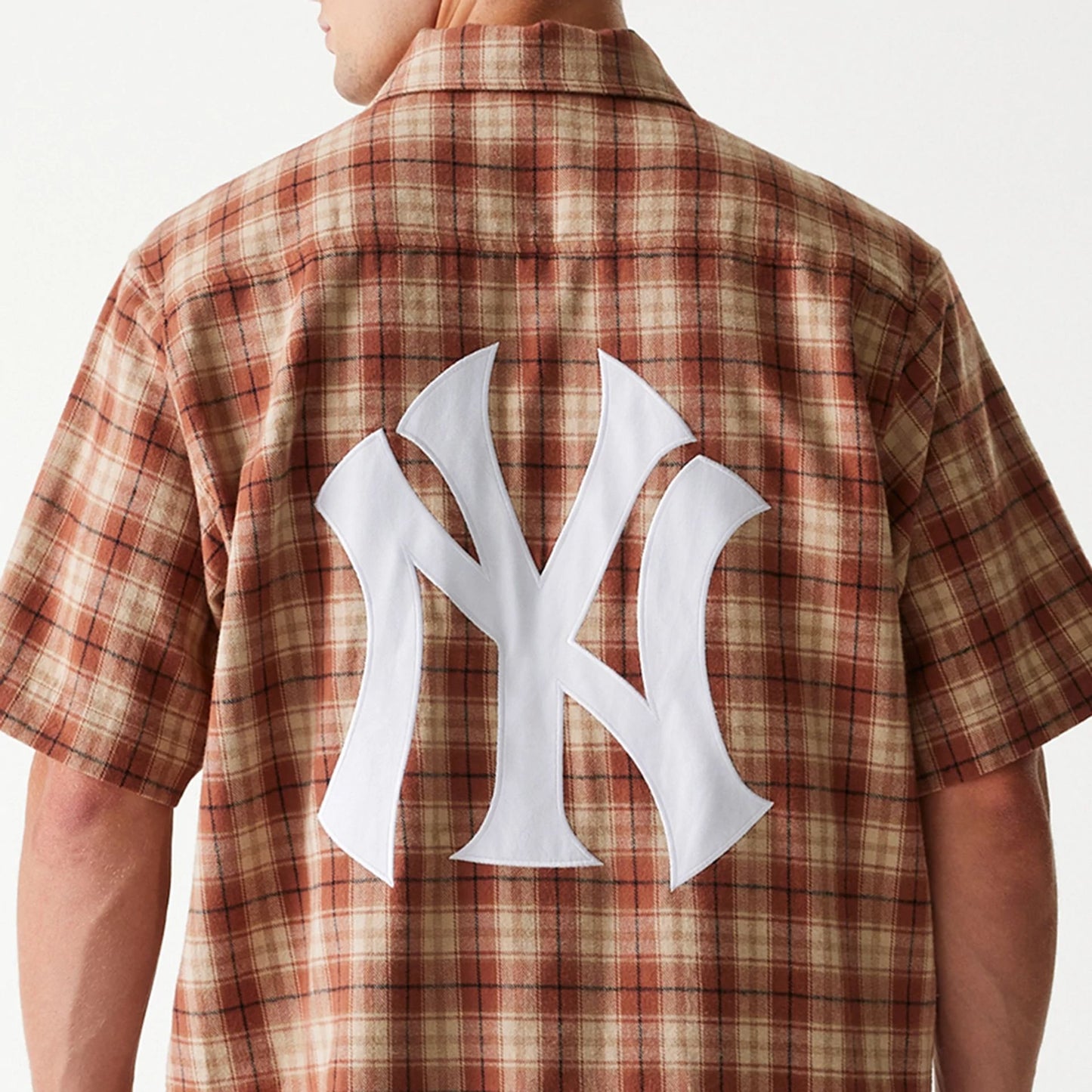 The Male model is wearing New York Yankees Plaid Brown Short Sleeve Shirt 7