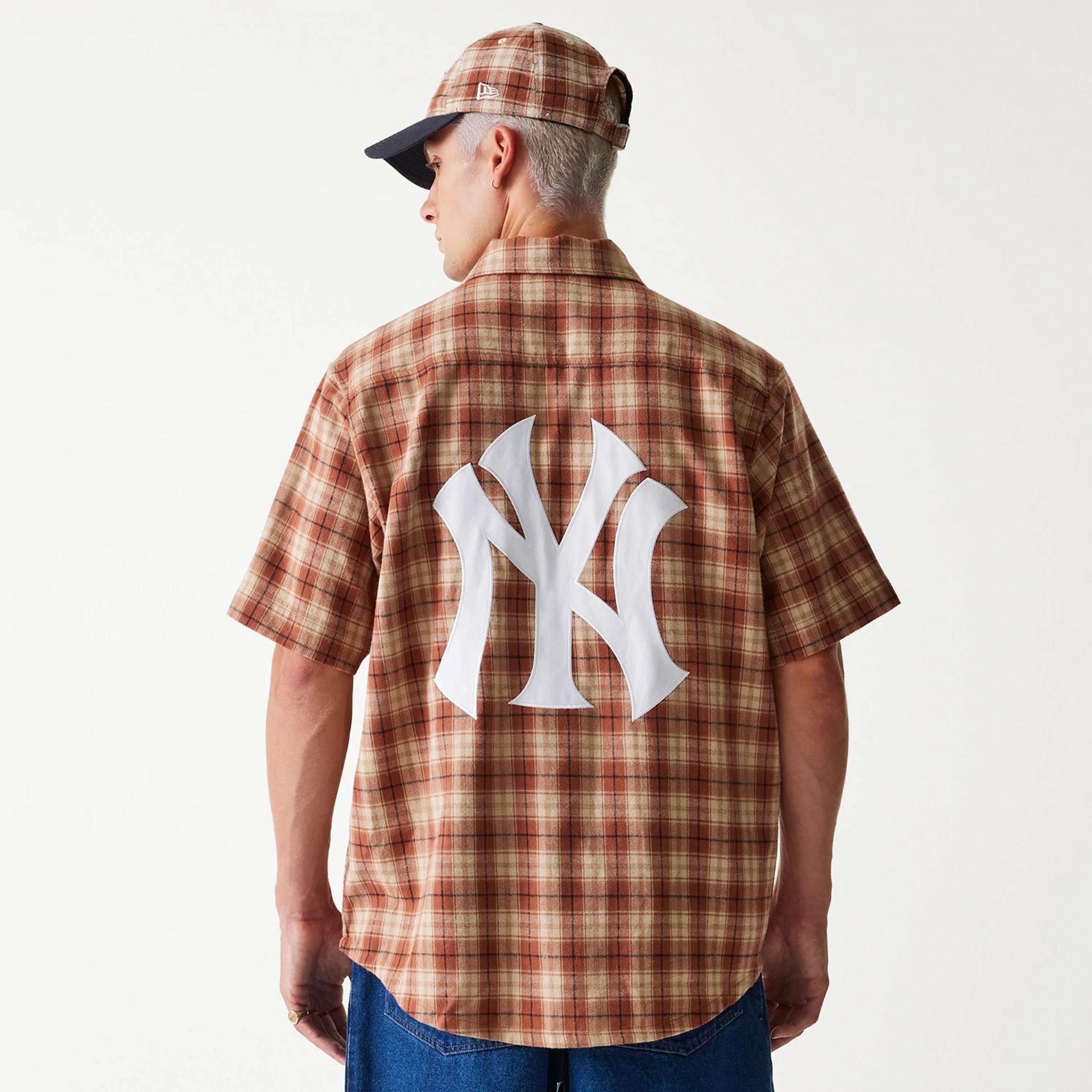 The Male model is wearing New York Yankees Plaid Brown Short Sleeve Shirt 2