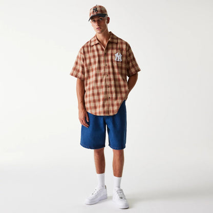 The Male model is wearing New York Yankees Plaid Brown Short Sleeve Shirt 8