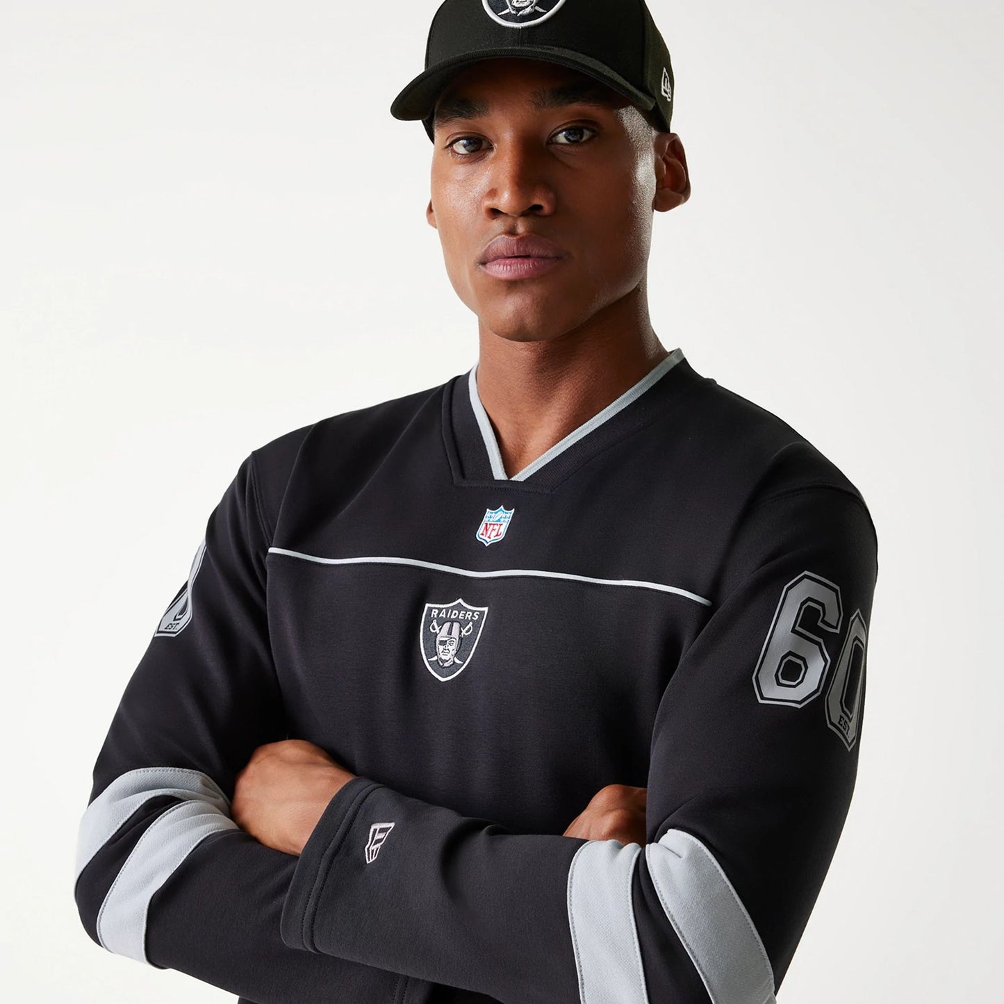 The Male model is wearing Las Vegas Raiders Korea Black Long Sleeve T-Shirt 4