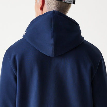 The Male model is wearing New York Yankees Korea Navy Pullover Hoodie 7