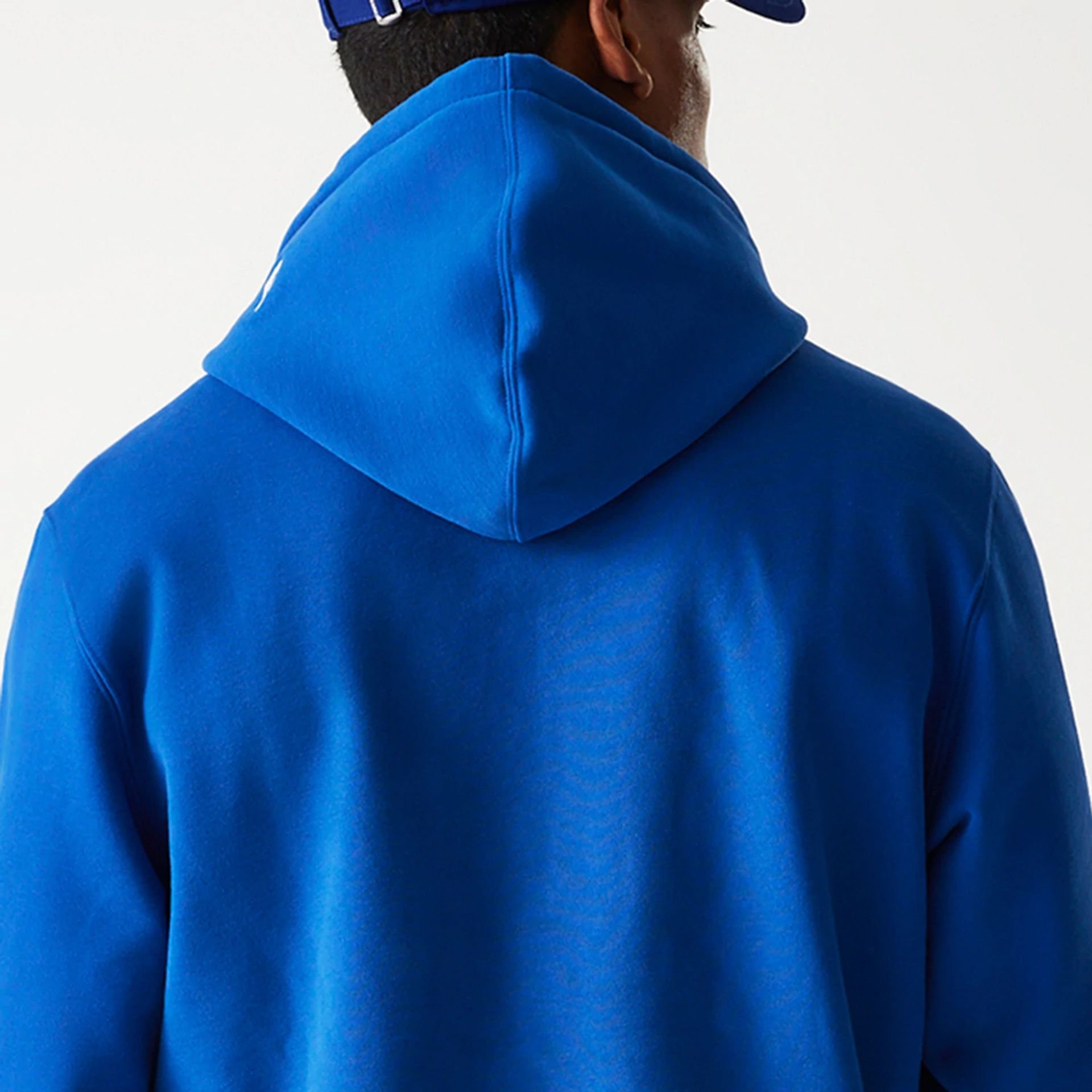 The Male model is wearing LA Dodgers Korea Blue Pullover Hoodie 7