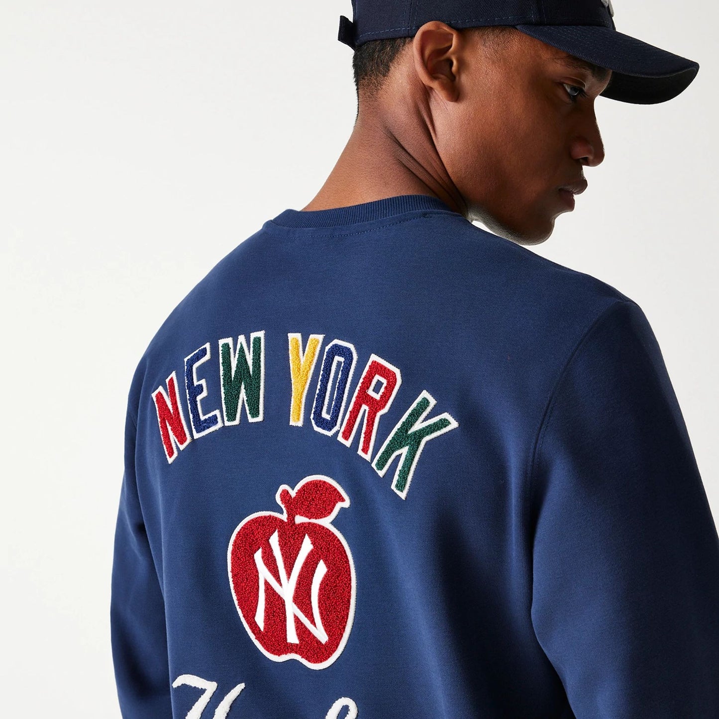 The Male model is wearing New York Yankees Korea Navy Sweatshirt 7