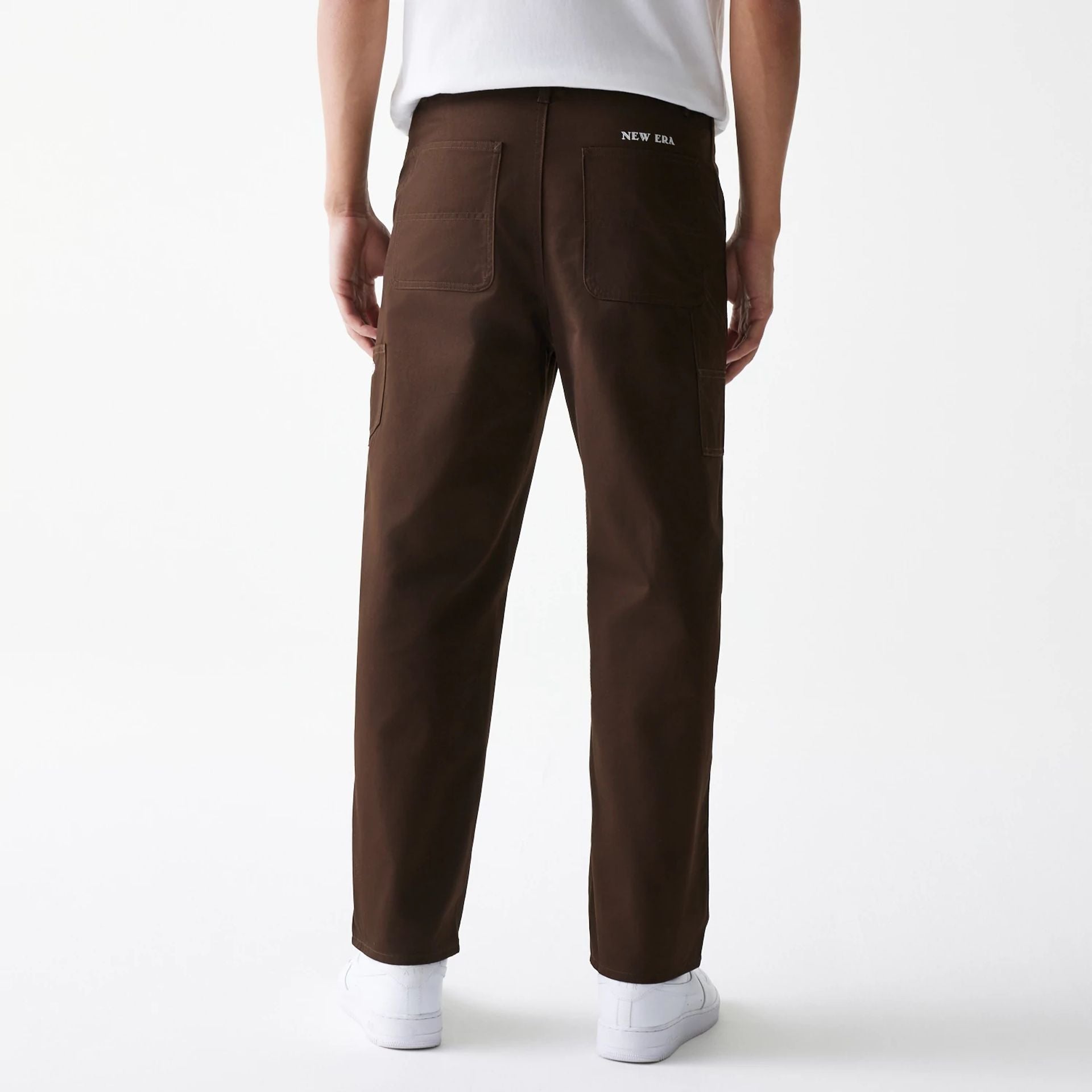 The Male model is wearing New Era Dark Brown Heavy Duty Trousers 2