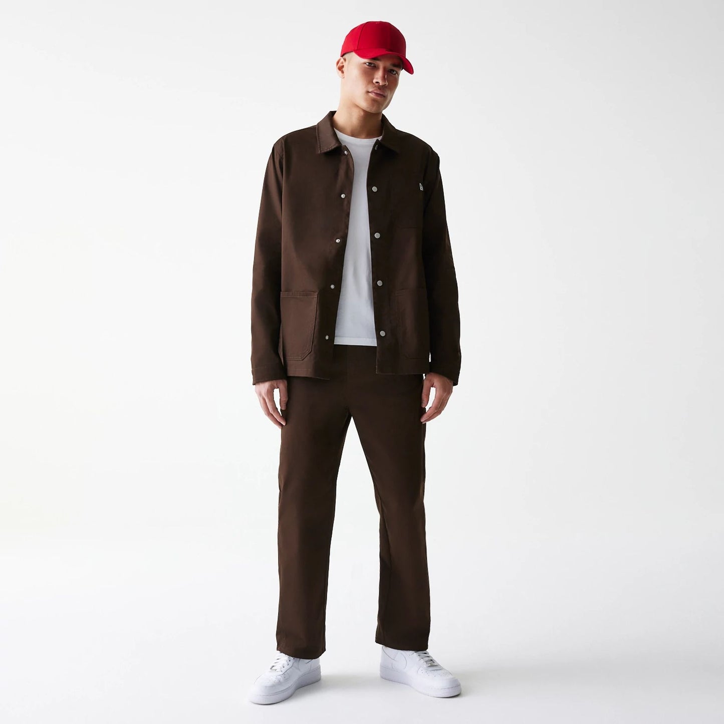 The Male model is wearing New Era Dark Brown Heavy Duty Trousers 8