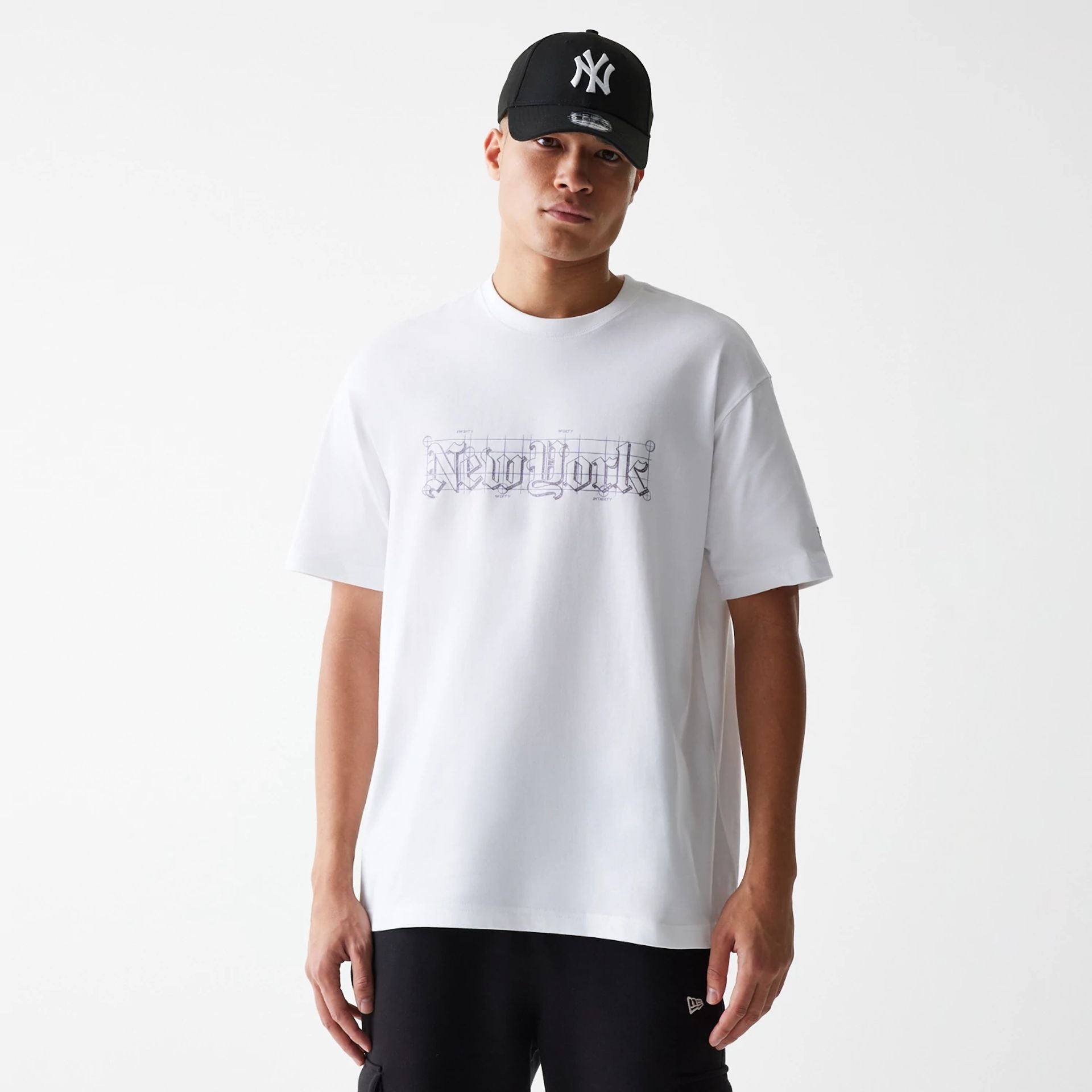 The Male model is wearing Ode To NY White Oversized T-Shirt 1