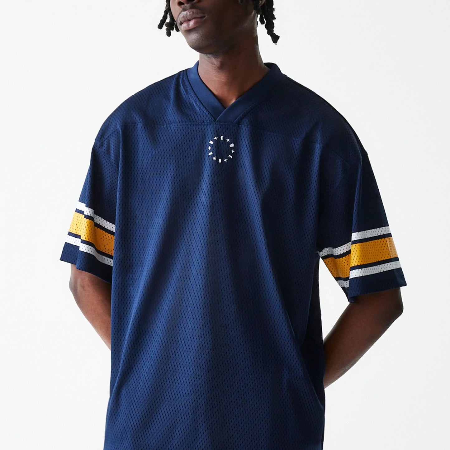 The Male model is wearing New Era Street Dangle Blue T-Shirt  3