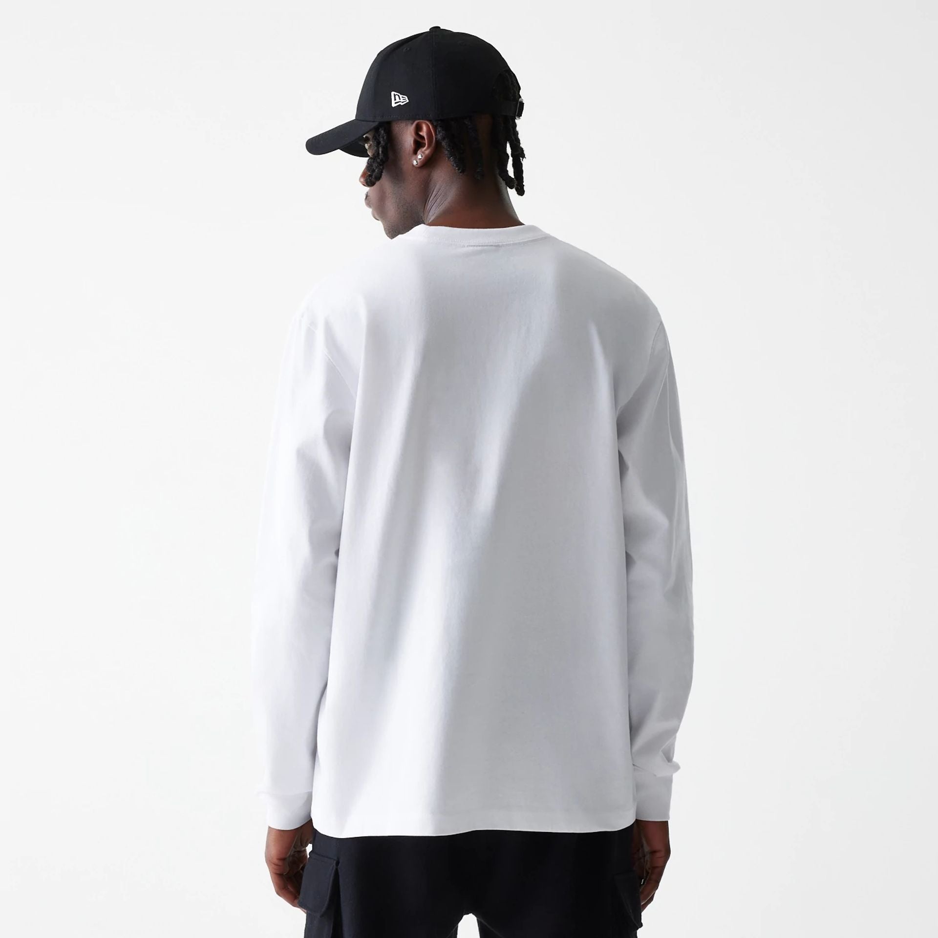 The Male model is wearing New Era Basic White Long Sleeve T-Shirt 2