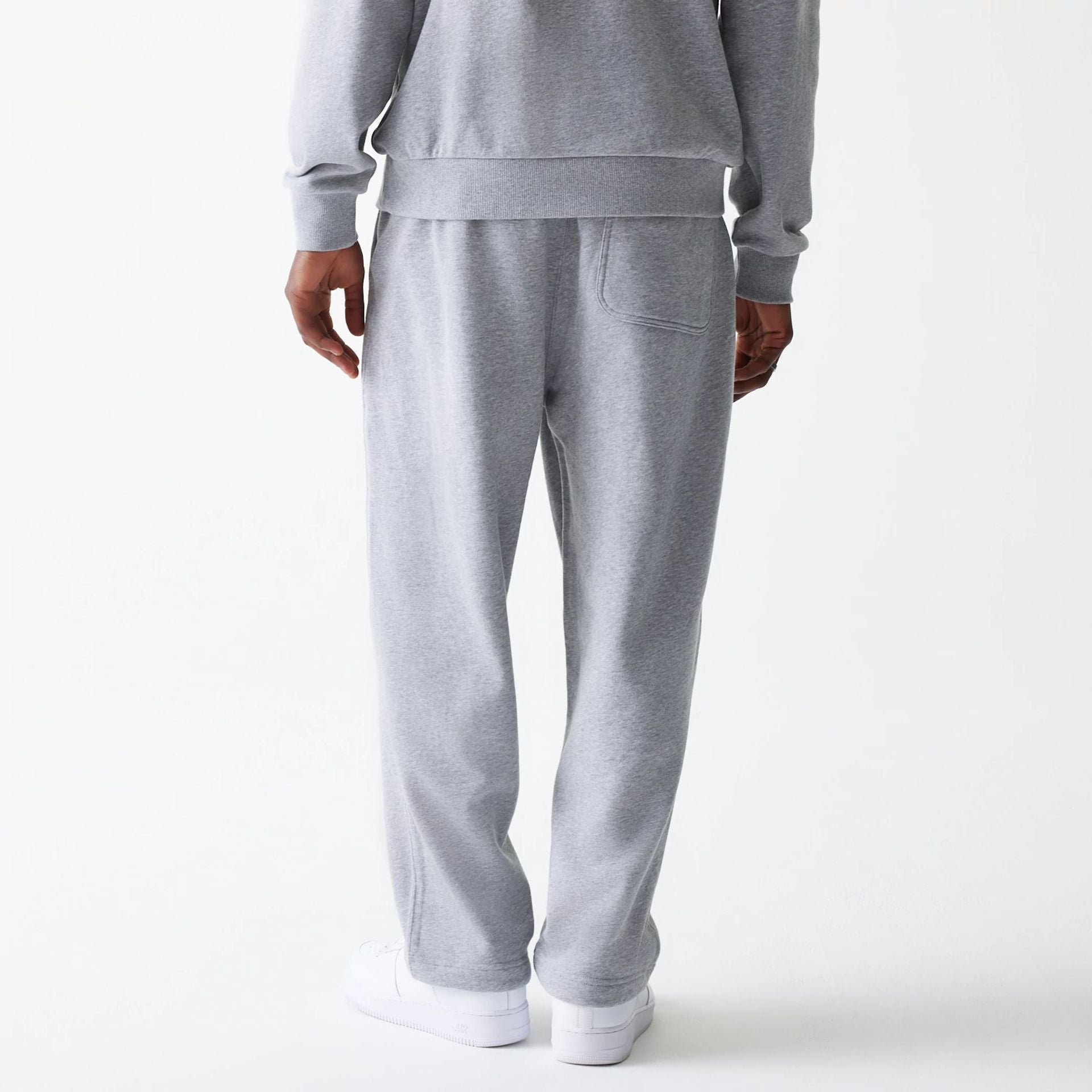 The Male model is wearing New Era Tonal Grey Joggers  2