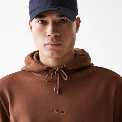 The Male model is wearing New Era Tonal Brown Pullover Hoodie  4