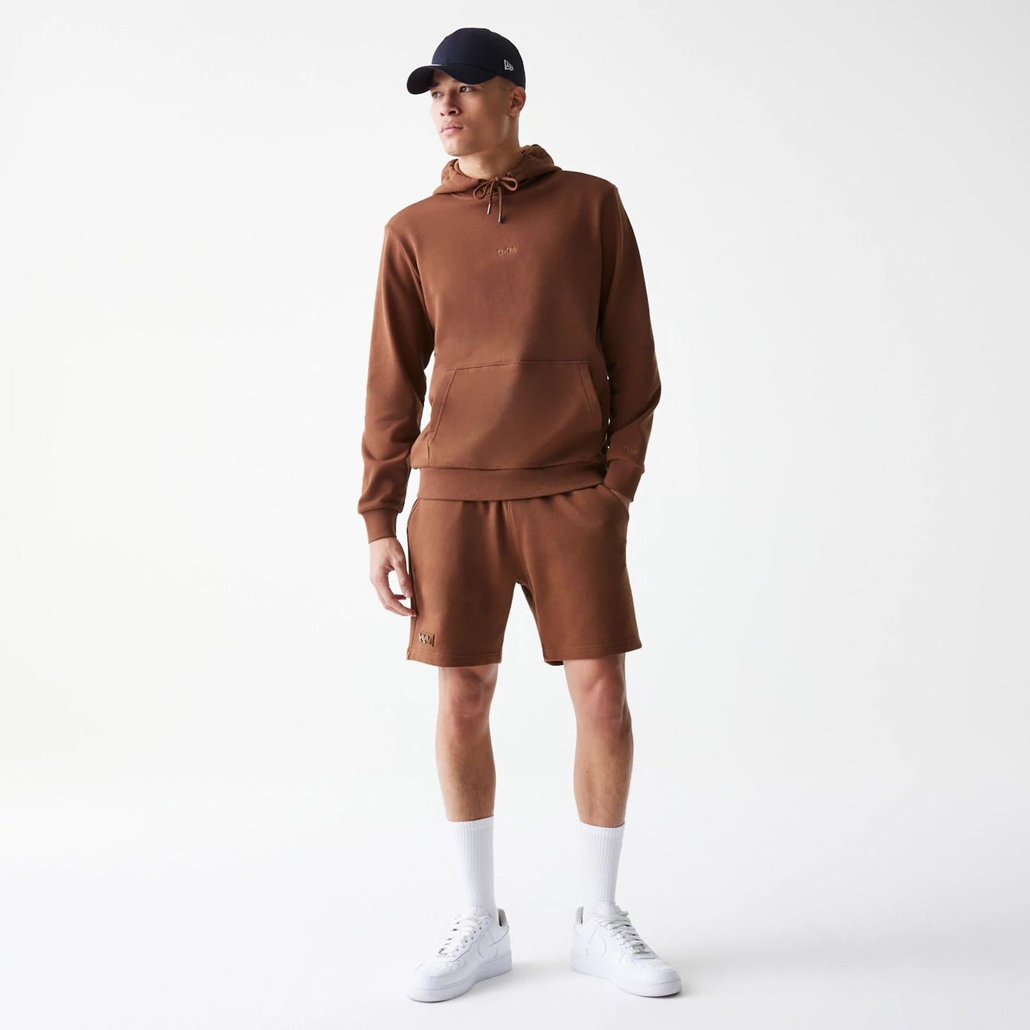 The Male model is wearing New Era Tonal Brown Pullover Hoodie  8