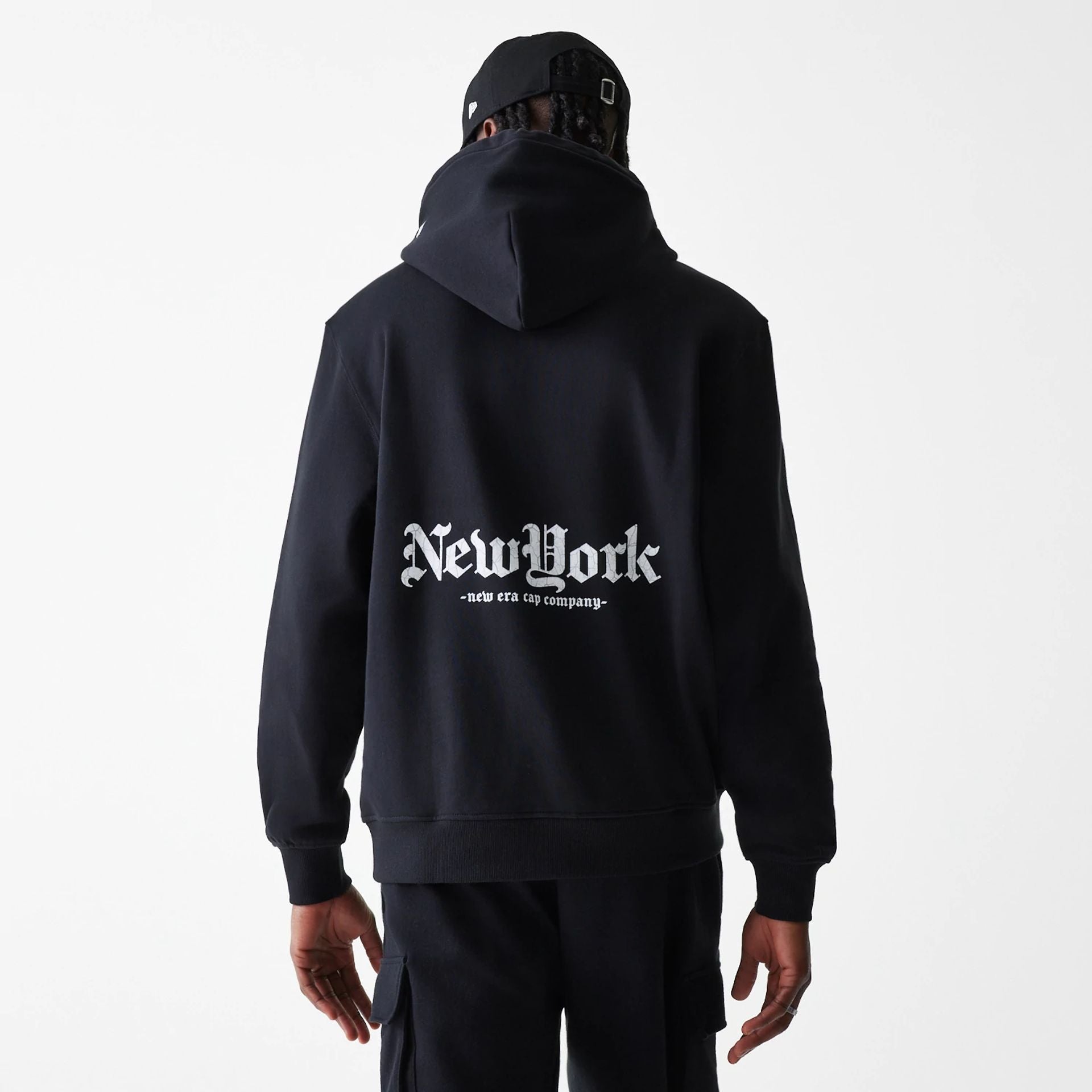 The Male model is wearing Ode To NY Black Pullover Hoodie 2