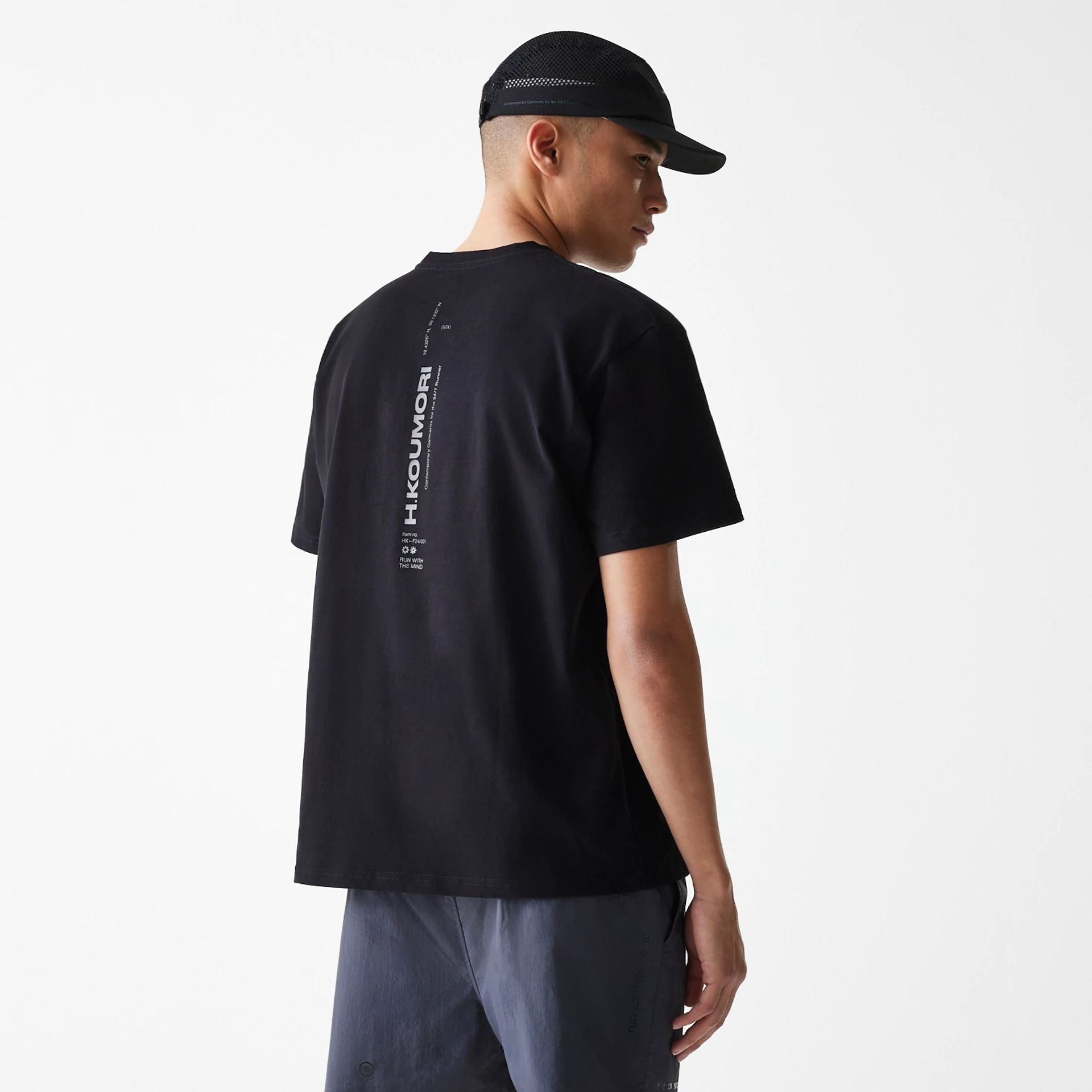 The Male model is wearing Hermanos Koumori x New Era Black T-Shirt 2