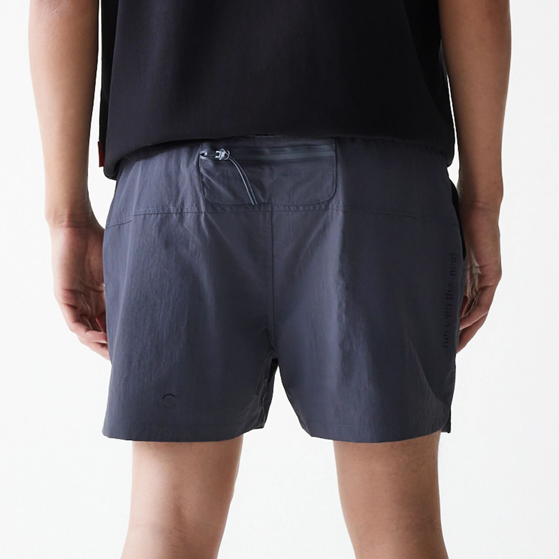 The Male model is wearing Hermanos Koumori x New Era Dark Grey Shorts 6