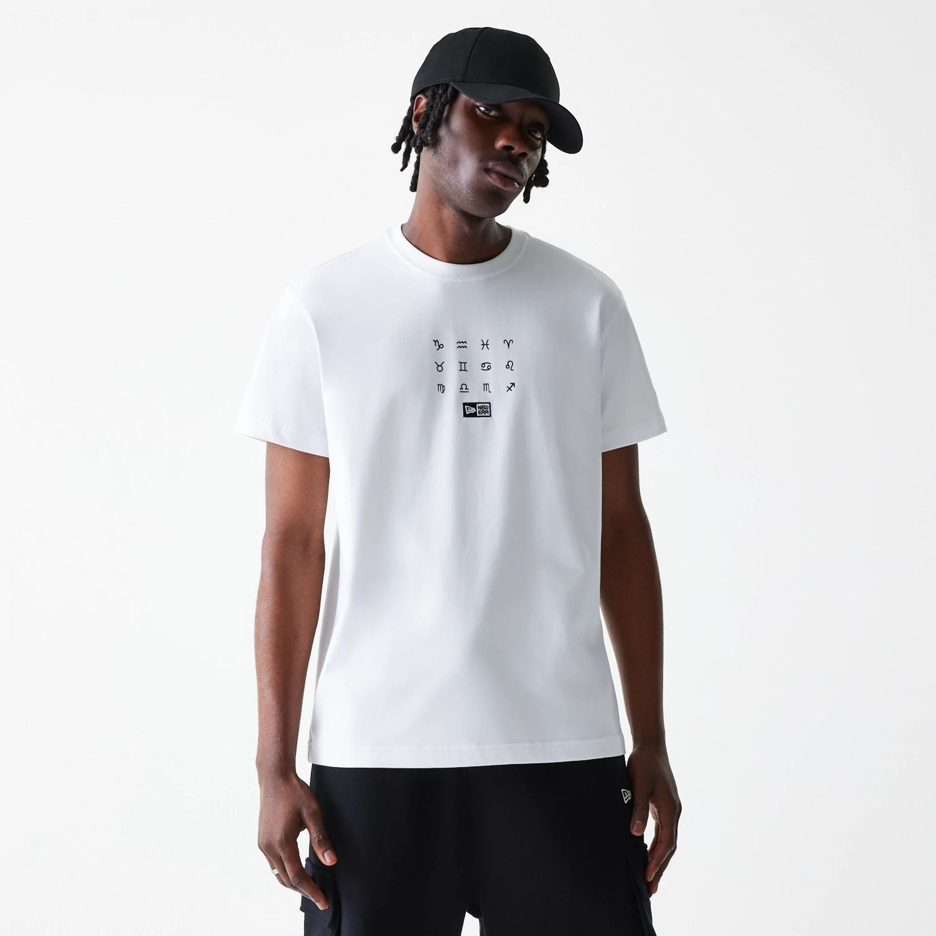 The Male model is wearing New Era Zodiac White T-Shirt 1