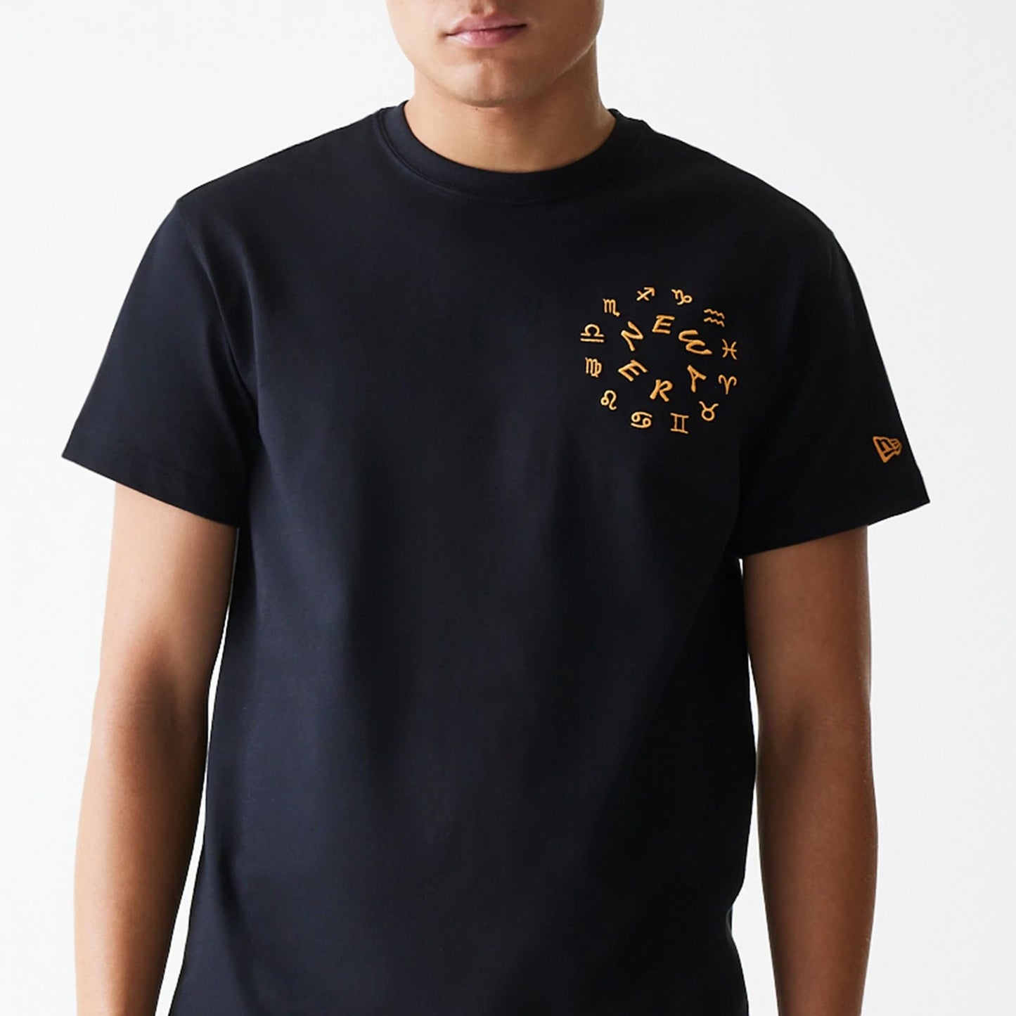 The Male model is wearing New Era Horoscope Black T-Shirt 3