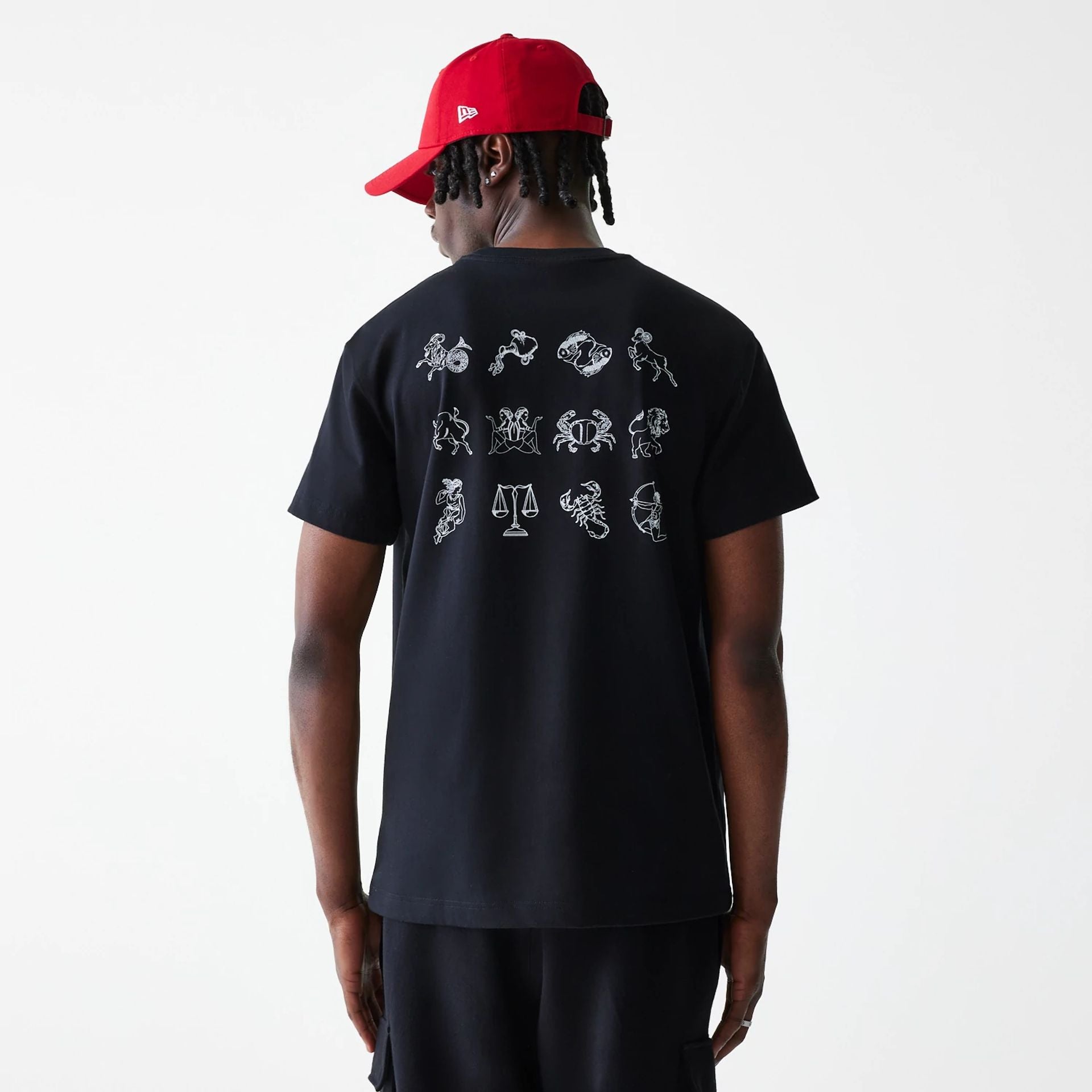 The Male model is wearing New Era Zodiac Black T-Shirt 2