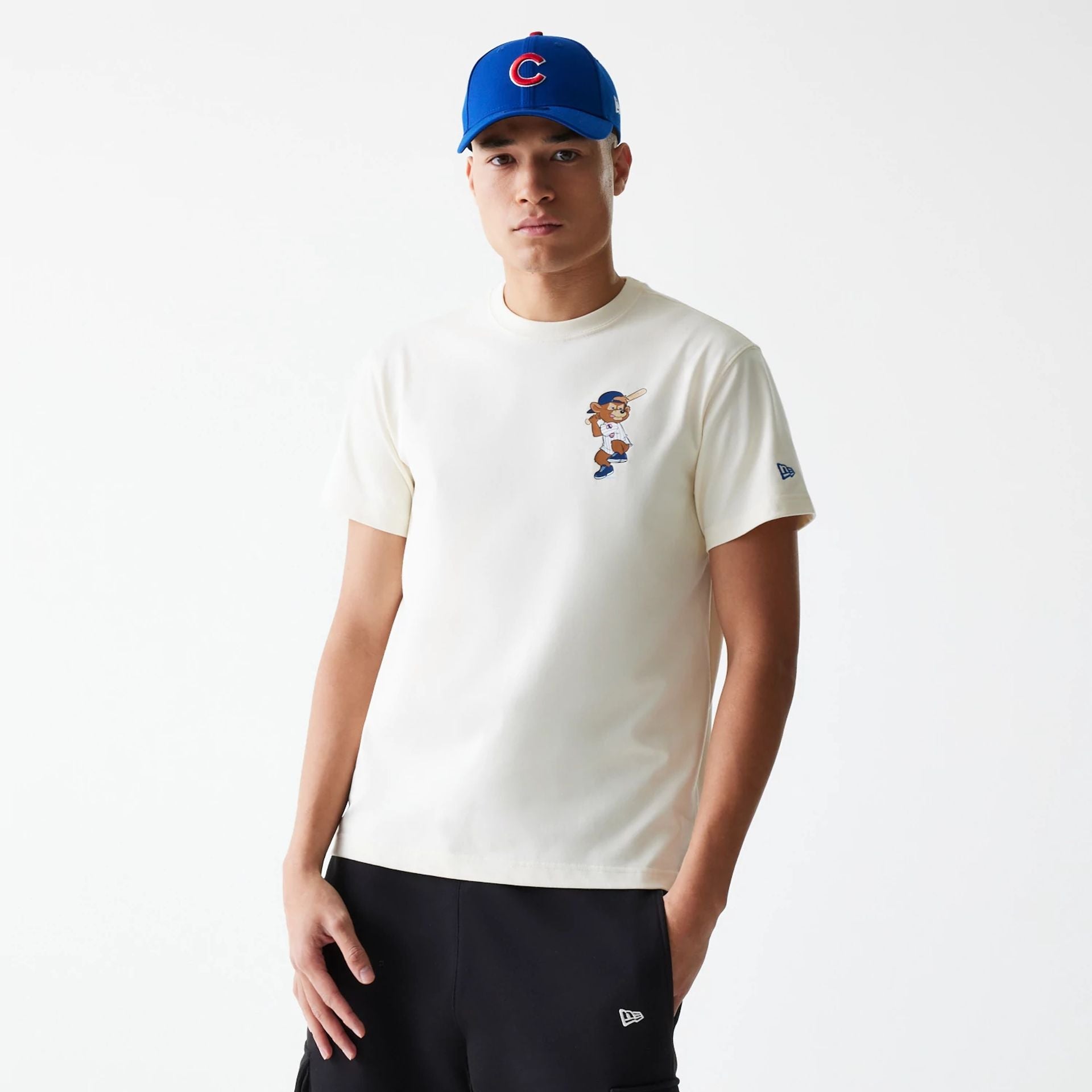 The Male model is wearing Chicago Cubs MLB Mascots Cream T-Shirt 1