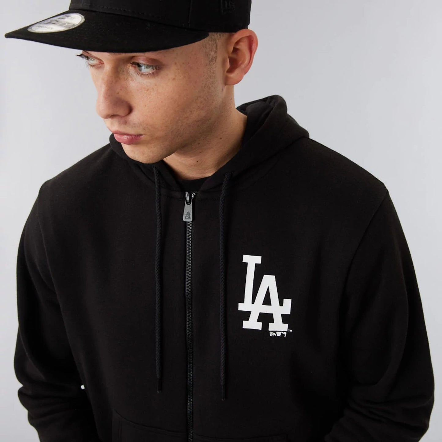 The Male model is wearing LA Dodgers MLB League Essential Black Full-Zip Hoodie 6