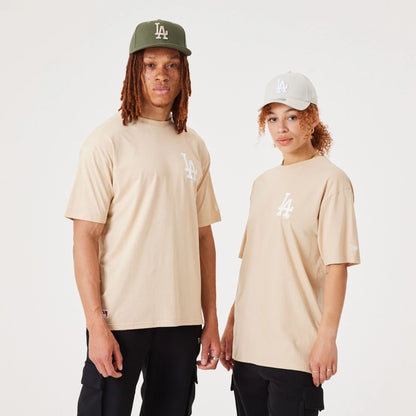 The Male model is wearing LA Dodgers MLB League Essential Light Beige Oversized T-Shirt 1