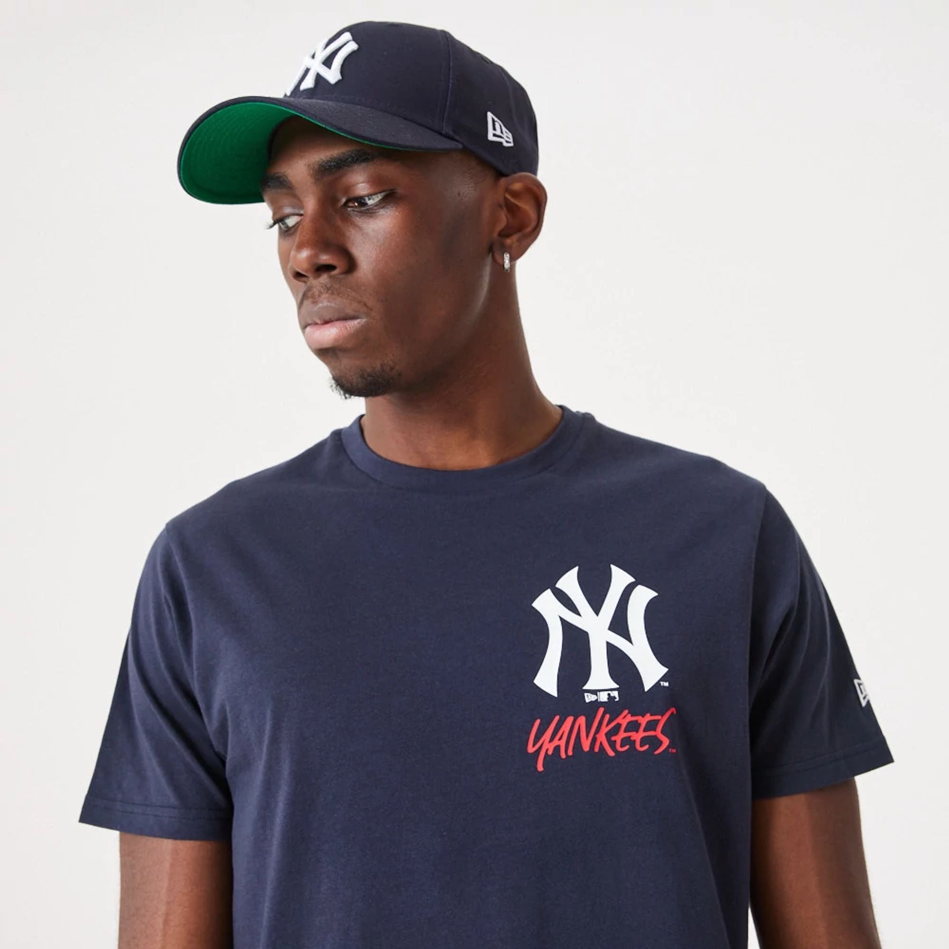 The Male model is wearing New York Yankees MLB Team Logo Graphic Navy T-Shirt 4