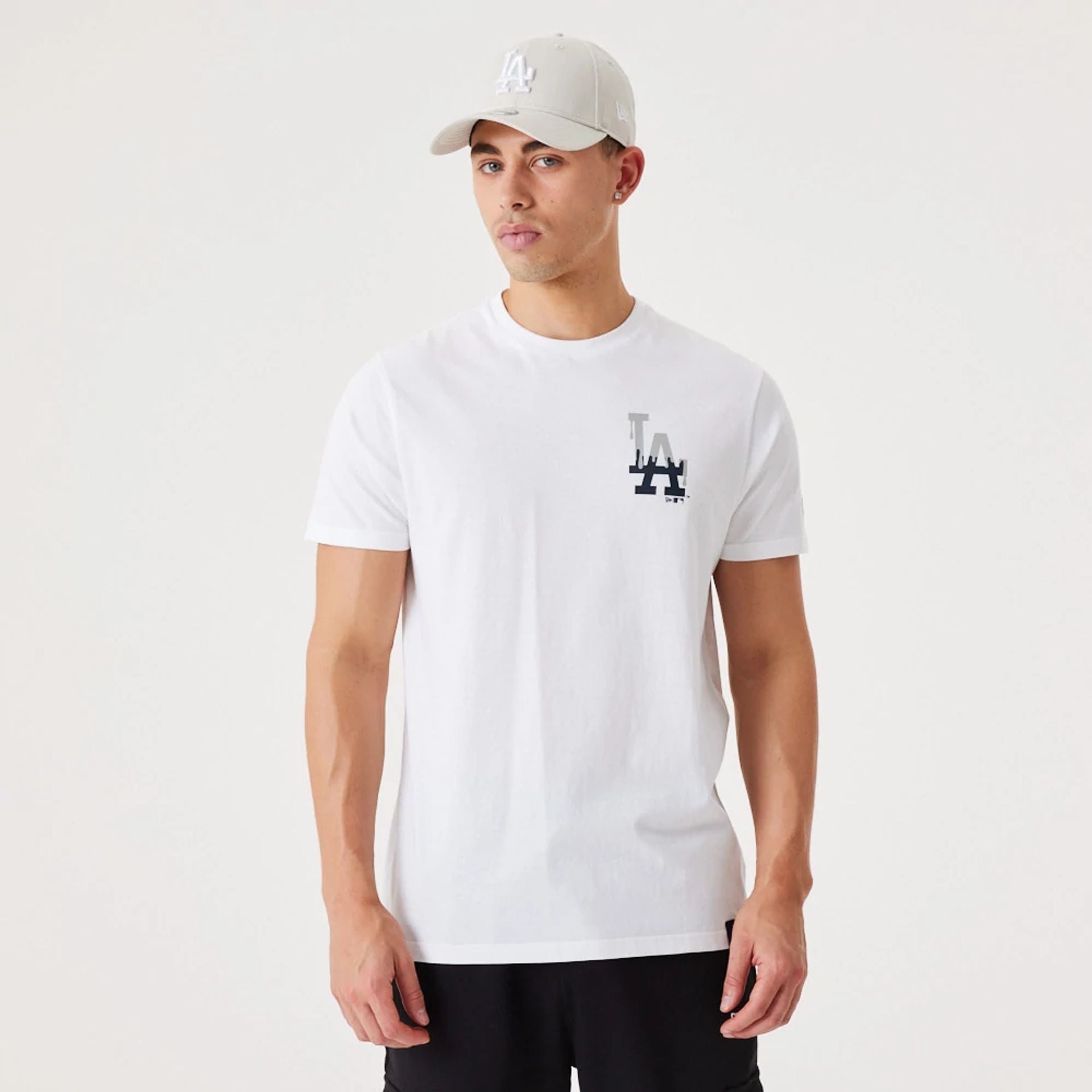 The Male model is wearing LA Dodgers MLB Drip Logo White T-Shirt 2