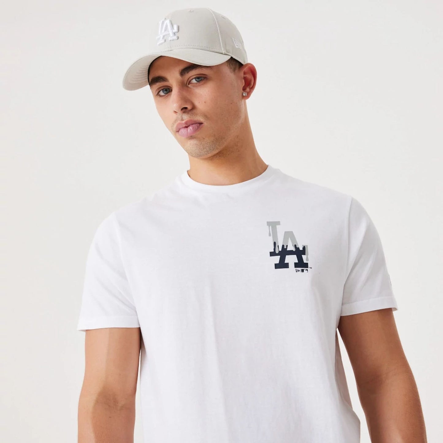 The Male model is wearing LA Dodgers MLB Drip Logo White T-Shirt 6