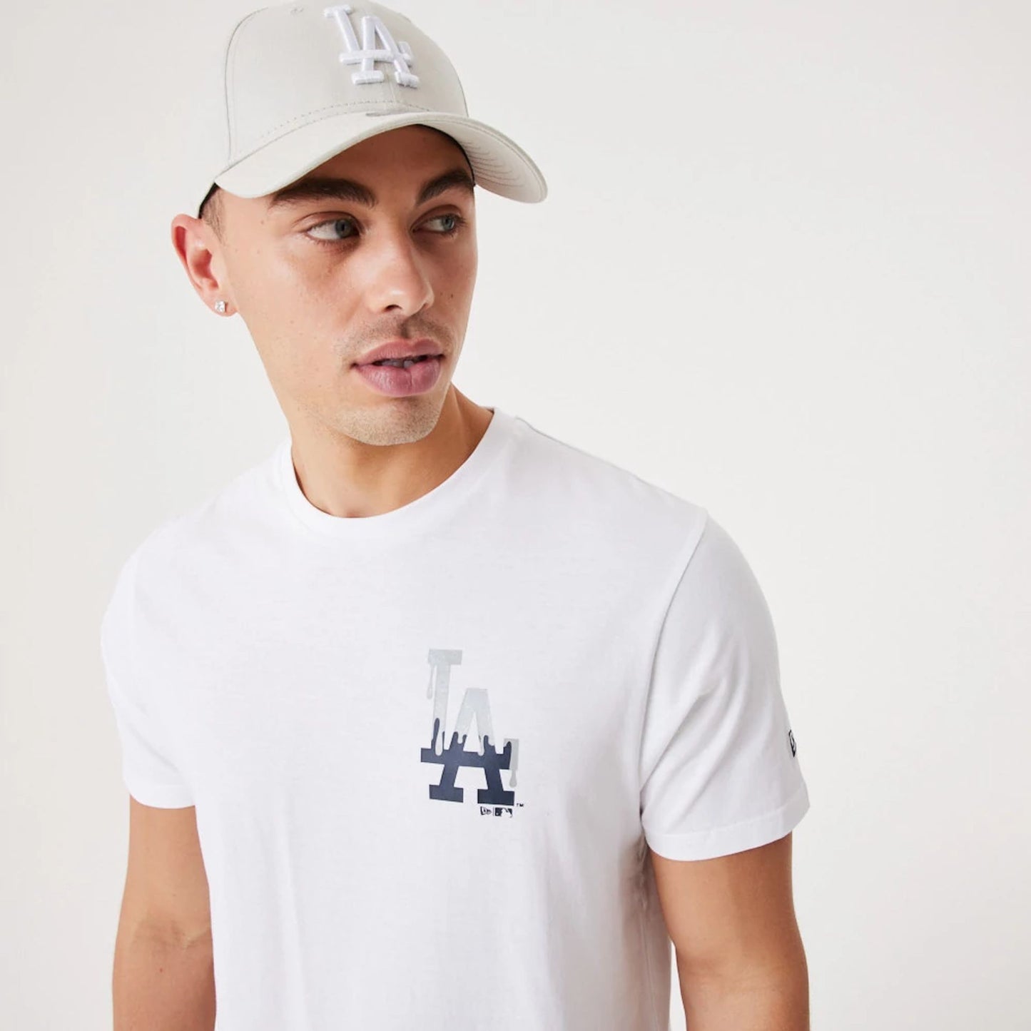 The Male model is wearing LA Dodgers MLB Drip Logo White T-Shirt 7