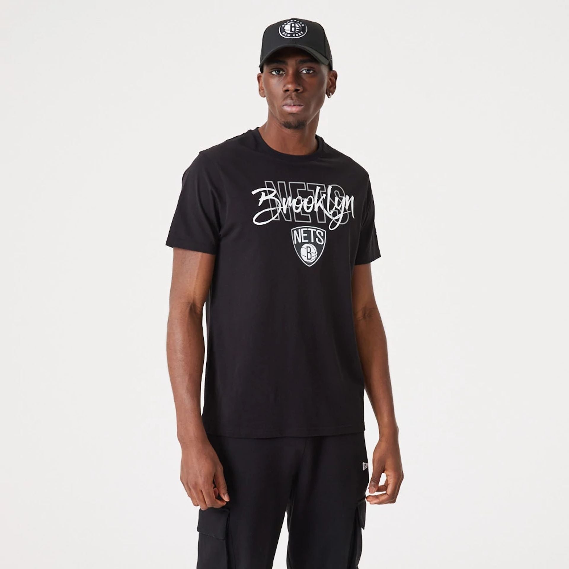 The Male model is wearing Brooklyn Nets NBA Script Black T-Shirt 2