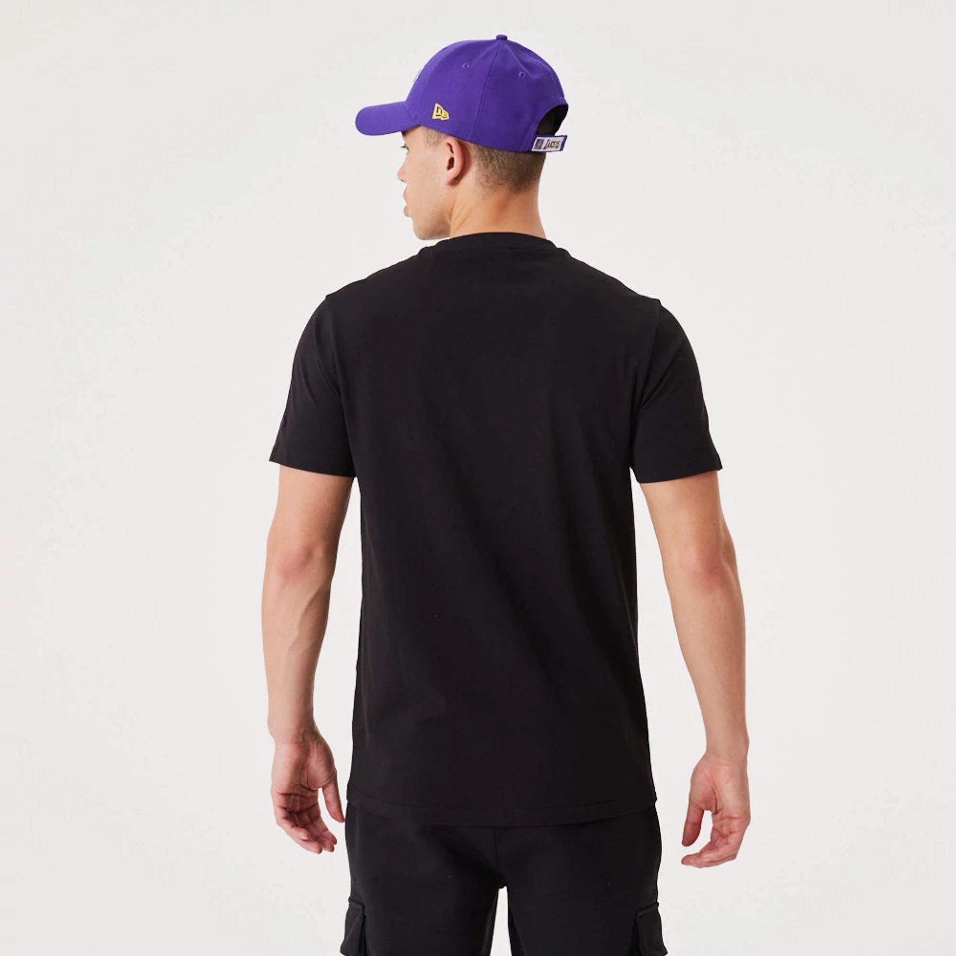 The Male model is wearing LA Lakers NBA Script Black T-Shirt 5