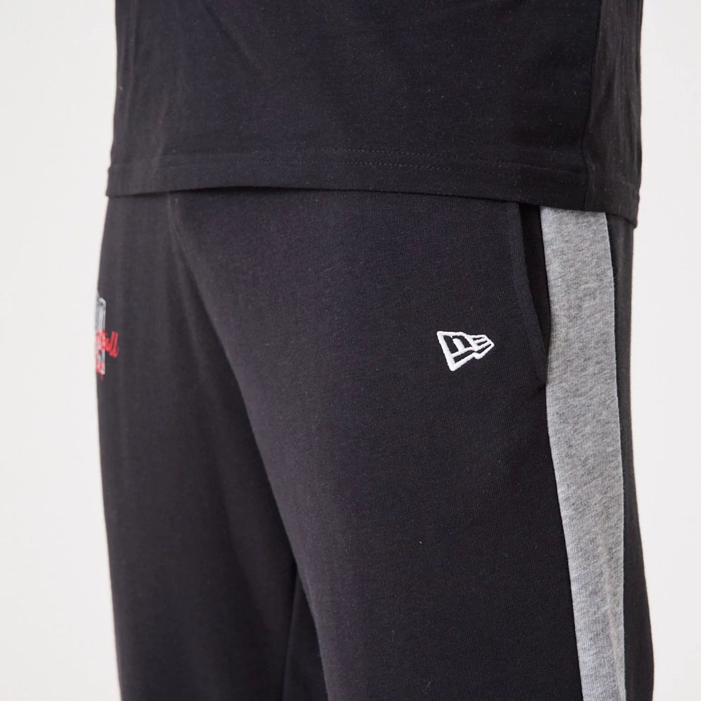 The Male model is wearing NBA Logo Script Black Joggers 5