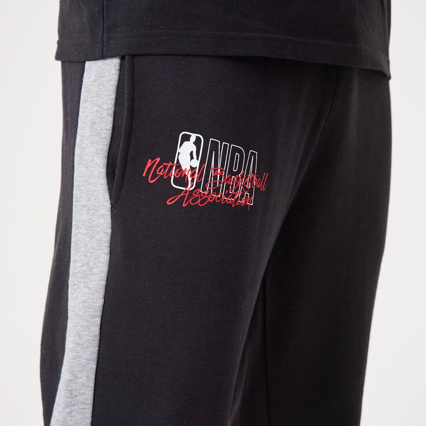 The Male model is wearing NBA Logo Script Black Joggers 2