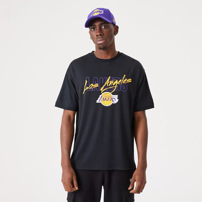 The Male model is wearing LA Lakers NBA Script Black Oversized T-Shirt 1